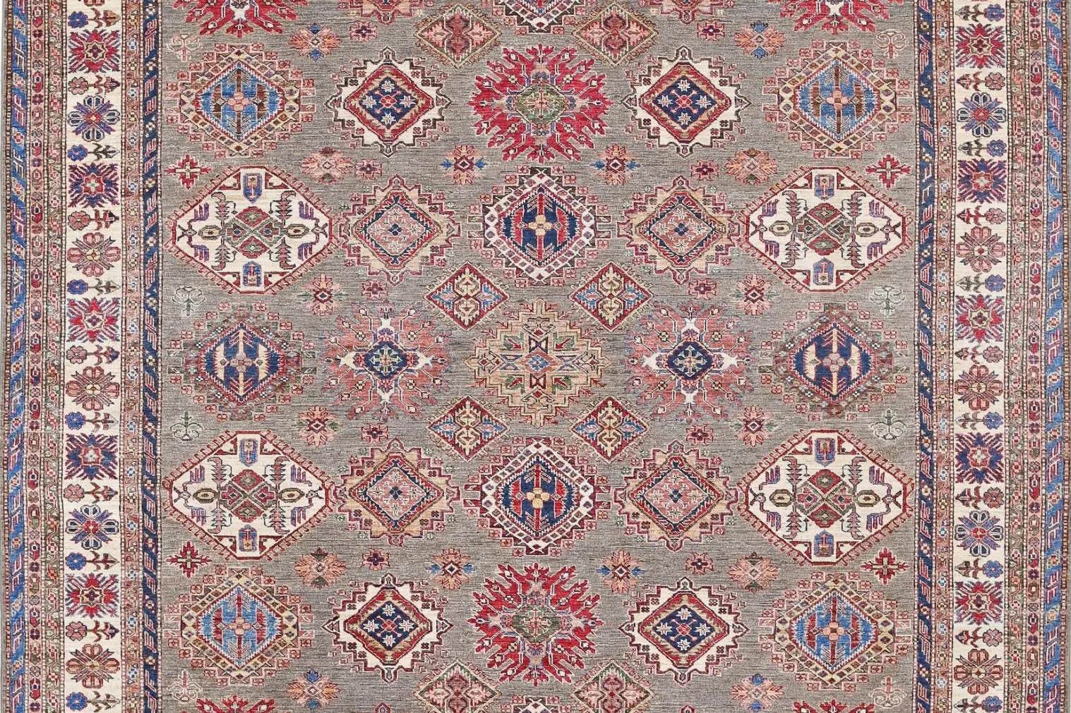 Alfombras Kazak — Guía Completa de la Geometría Tribal, Historia y Cómo Elegir una