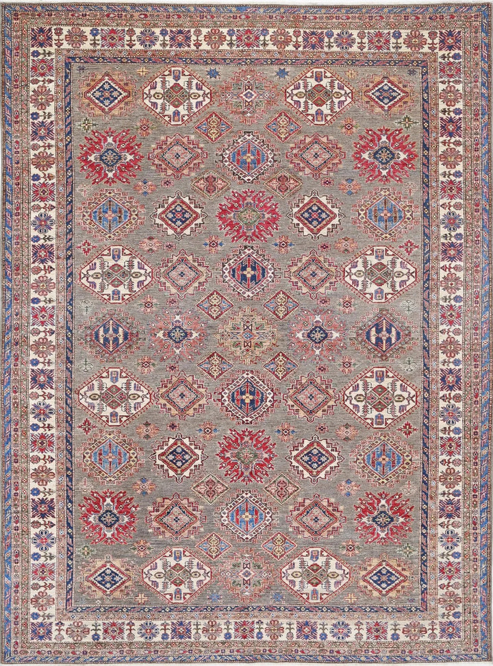 Hand-knotted Kazak wool rug with bold tribal geometry in vivid color