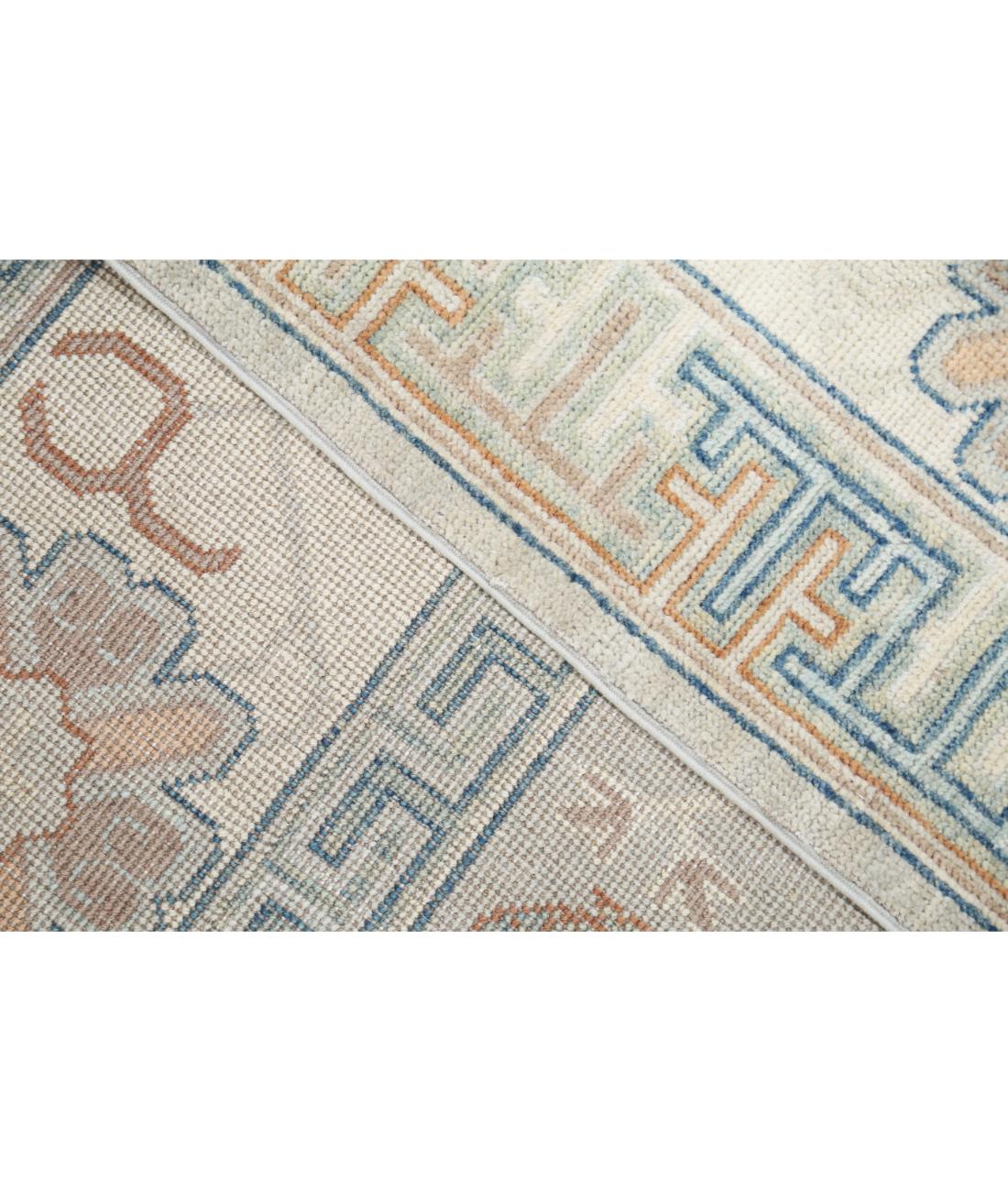 Hand Knotted Khotan Wool Rug - 10'2'' x 13'8''